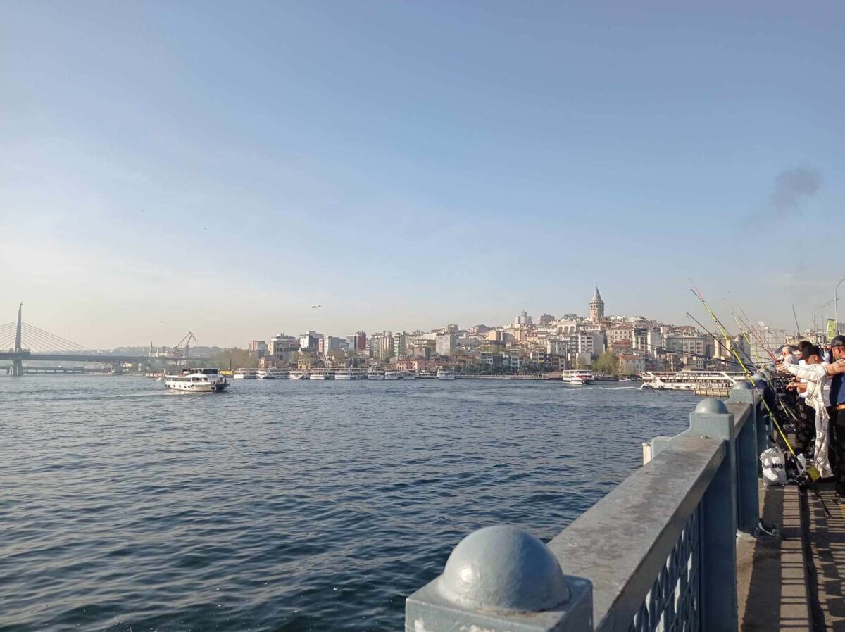 Galata Bridge and view of Galata tower in Beyoglu - one of the best neighborhoods to stay as a first-time tourist in Istanbul