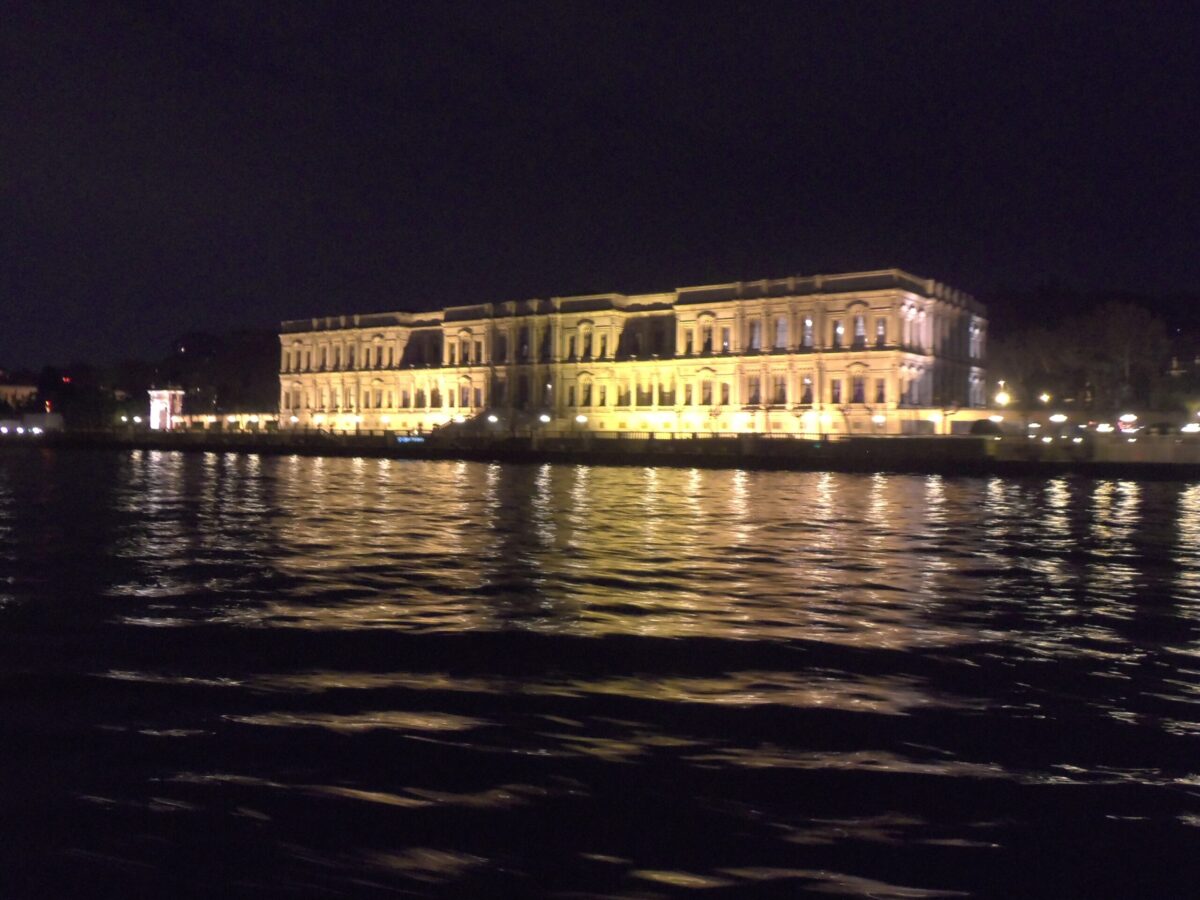 Bosphorus dinner cruise with show program - views from the water at night in Istanbul