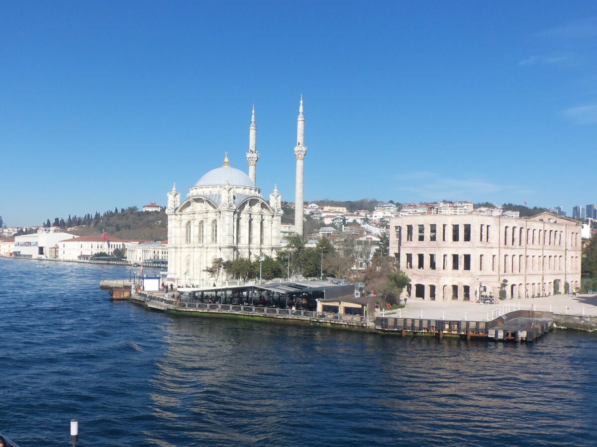Ortakoy mosque Istanbul from the water - view from a Bosphorus cruise on a boat